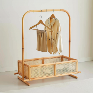 A floor-to-ceiling, space-saving, open, movable iron rack for storing clothes at the bedside in the bedroom
